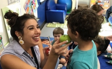 Brighton Center Teacher Teaching Child