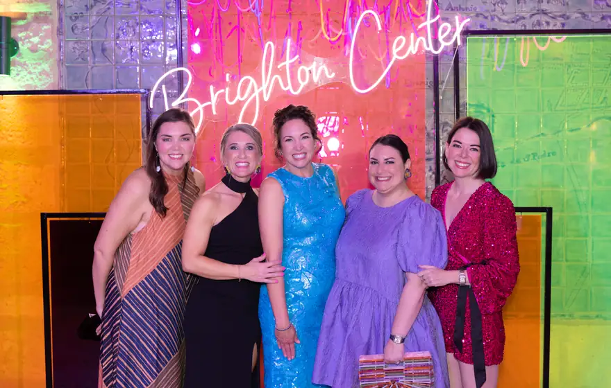Guests in front of the Brighton Center sign at Best Night Ever